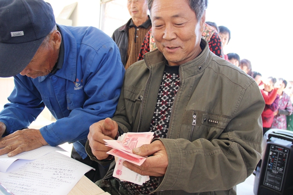 葫芦岛村民分红十八年，今年喜获丰厚回报——共创繁荣的乡村新篇章_解答解释